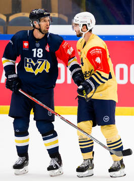 Topi Jaakola of HV71 and Alexis Loiseau of Esbjerg in a