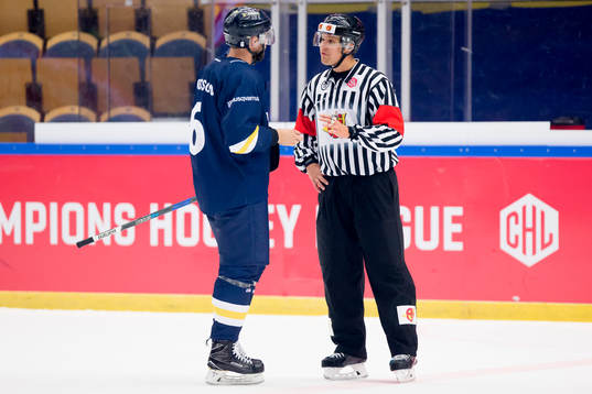 Christoffer Persson  of HV71 in a discussion with referee