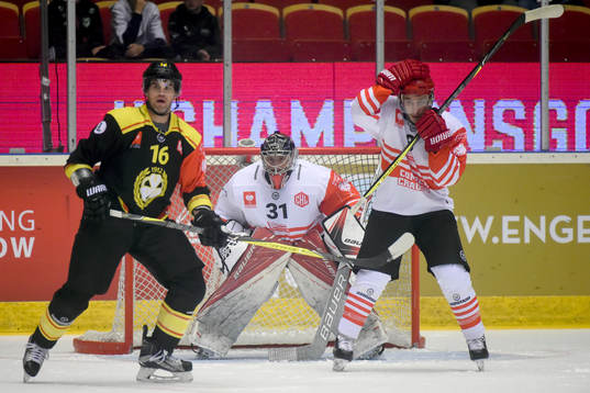 Daniel Paille of Brynäs and Goalkeeper Rafal Radziszewski