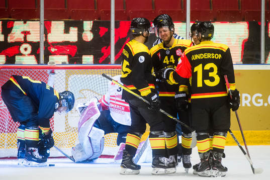 Jacob Blomqvist of Brynäs celebrates with Louie Caporusso