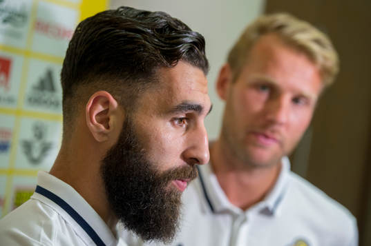 Swedish player Jimmy Durmaz (l) and Ola Toivonen meet media
