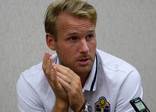 Swedish player Ola Toivonen meets media at a Mixed Zone