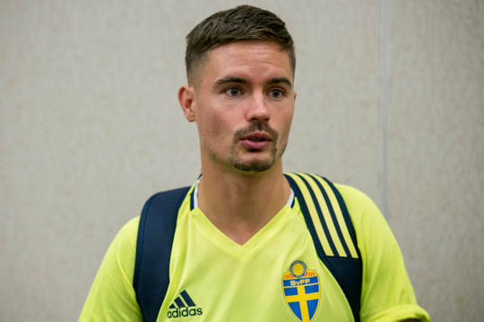 Swedish player Mikael Lustig meets media at a Mixed Zone