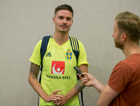 Swedish player Mikael Lustig meets media at a Mixed Zone