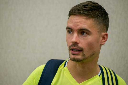 Swedish player Mikael Lustig meets media at a Mixed Zone