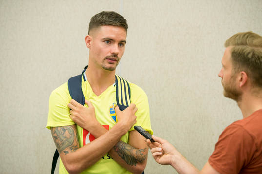 Swedish player Mikael Lustig meets media at a Mixed Zone