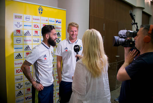 Swedish player Jimmy Durmaz (l) and Ola Toivonen meet media