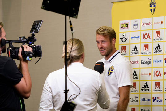 Swedish player Ola Toivonen meets media at a Mixed Zone