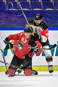 Fredrik Händemark of Malmö Redhawks and Spencer Humphries
