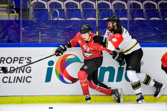 Fredrik Händemark of Malmö Redhawks and Spencer Humphries