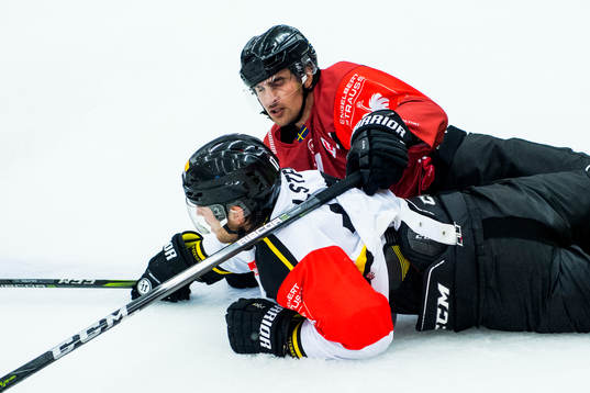 Nils Andersson of Malmö Redhawks and Eirik Salsten of