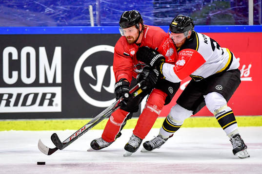 Stefan Warg of Malmö Redhawks and Lassi Kokkala of