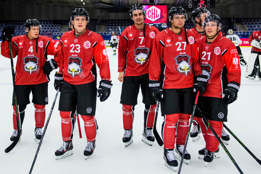 Malmö Redhawks players celebrate with the crowd