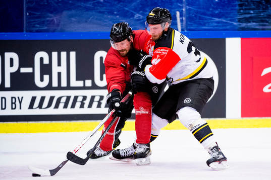 Stefan Warg of Malmö Redhawks and Lassi Kokkala of