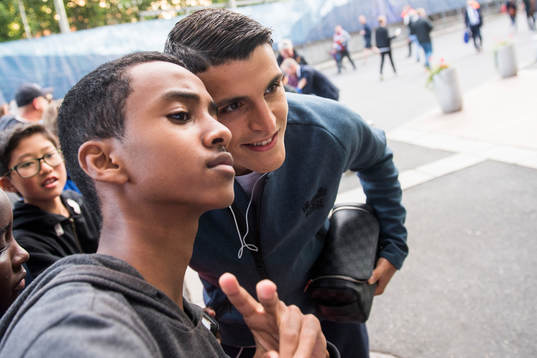 Mohamed Elyounoussi takes a picture with a fan