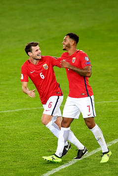Håvard Nordtveit of Norway celebrates with Joshua King who