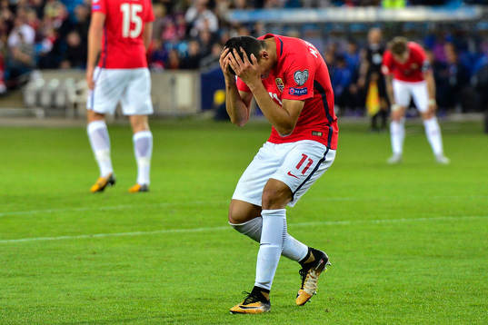 Mohamed Elyounoussi of Norway looks dejected