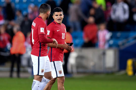 Omar Elabdellaoui and Tarik Elyounoussi of Norway