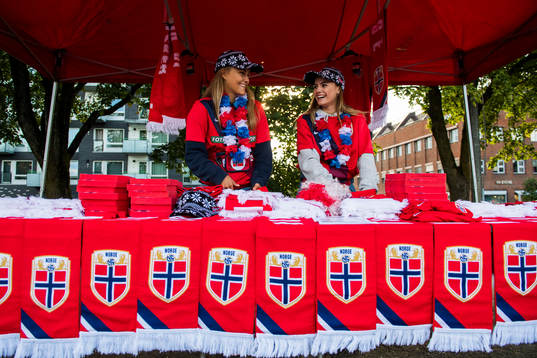 Emma Sand and Jeanine Skjellum are selling merchandise