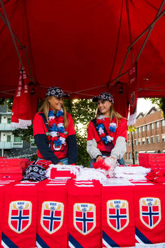 Emma Sand and Jeanine Skjellum are selling merchandise