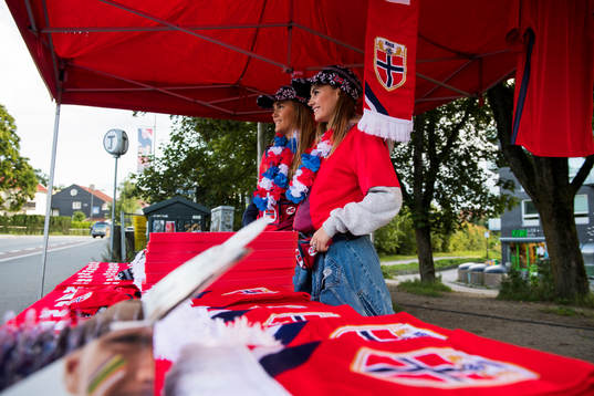 Emma Sand and Jeanine Skjellum are selling merchandise