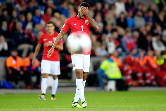 Joshua King of Norway looks dejected