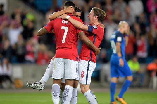 Joshua King of Norway celebrates with Mohamed Elyounoussi