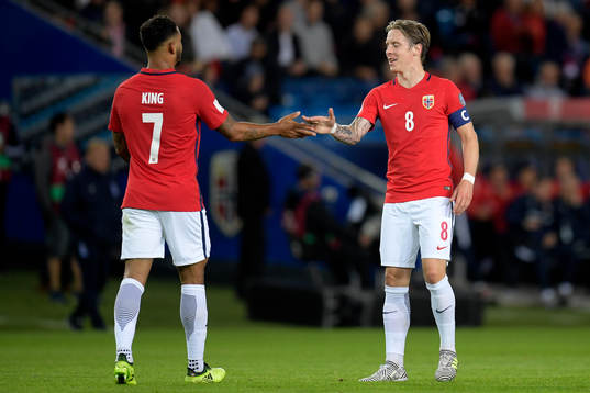 Joshua King of Norway celebrates with Stefan Johansen of