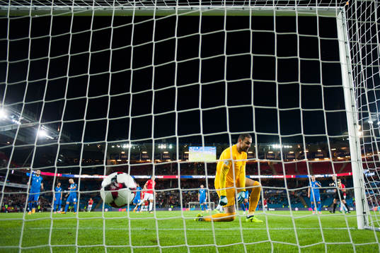 Goalkeeper Kamran Agayev of Azerbaijan looks dejected