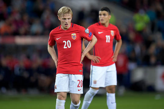 Mats Møller Dæhli and Mohamed Elyounoussi of Norway look