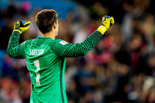 Goalkeeper Rune Almenning Jarstein of Norway celebrates 1-0