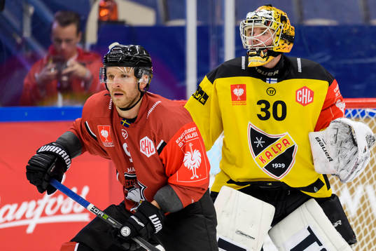 Frederik Storm of Malmö Redhawks and Goalkeeper Dennis
