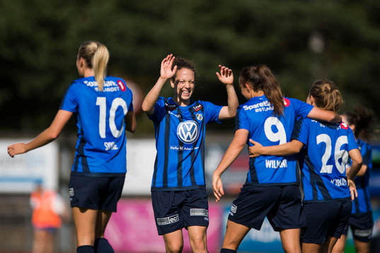 Andrea Wilmann celebrates with his teammates
