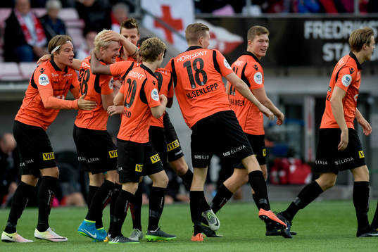Geir André Herren of Åsane celebrates with his teammates