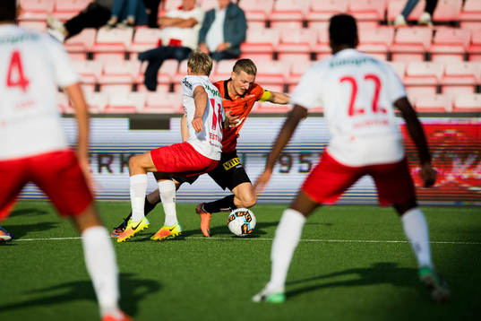Erik Andre Huseklepp of Åsane and Filip Johansen Westgård