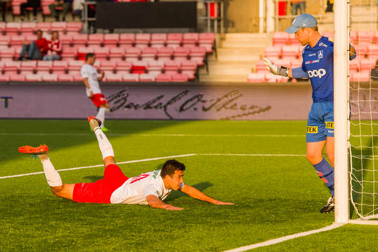 Sanel Kapidzic of Fredrikstad and Goalkeeper Eirik