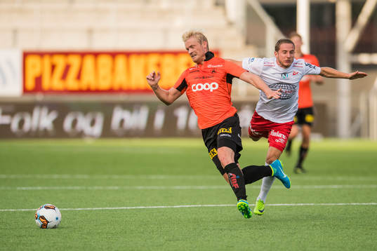 Geir André Herren of Åsane and Ludvig Begby of Fredrikstad