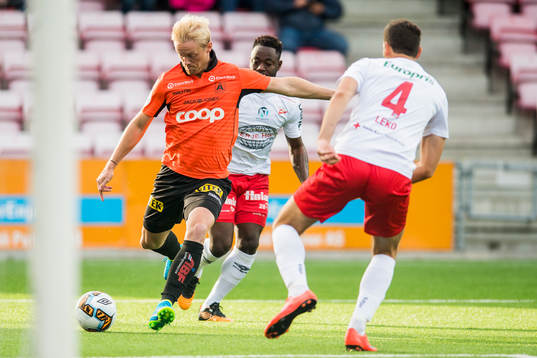 Geir André Herren of Åsane, Razak Nuhu and Mislav Leko of