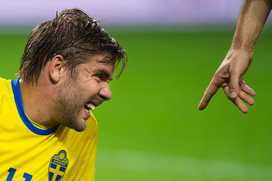 Sveriges Christoffer Nyman grimaserar