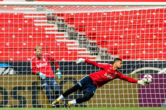 Goalkeeper Sten Grytebust makes a save in front of André