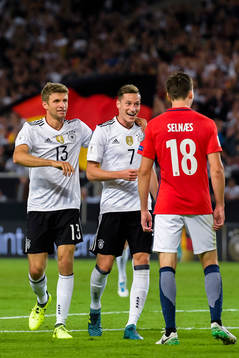 Thomas Müller and Julian Draxler of Germany celebrates the