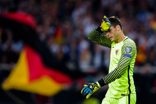 Goalkeeper Rune Almenning Jarstein of Norway looks dejected