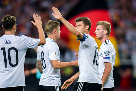 Mesut Özil, Toni Kroos and Thomas Müller of Germany