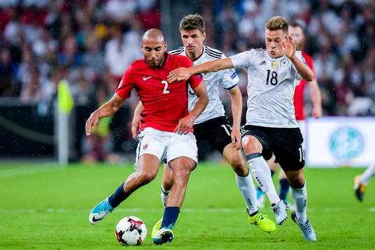 Haitam Aleesami of Norway and Joshua Kimmich of Germany