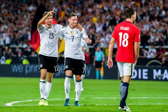 Thomas Müller and Julian Draxler of Germany celebrates the