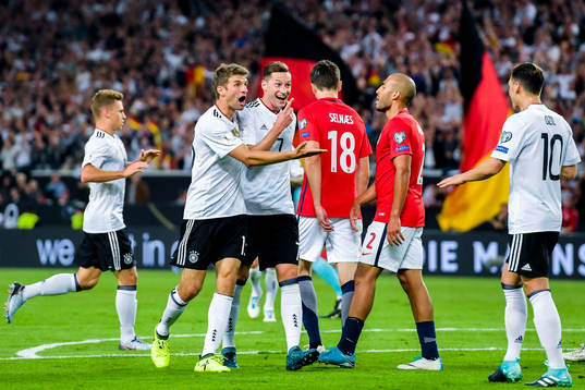 Thomas Müller and Julian Draxler of Germany celebrates the