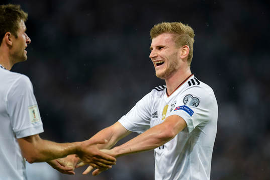 Thomas Müller and Timo Werner of Germany celebrates the