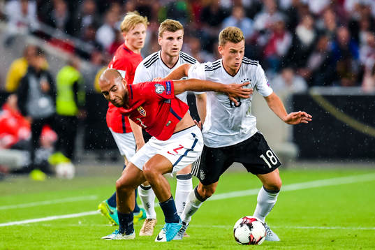 Haitam Aleesami of Norway and Joshua Kimmich of Germany