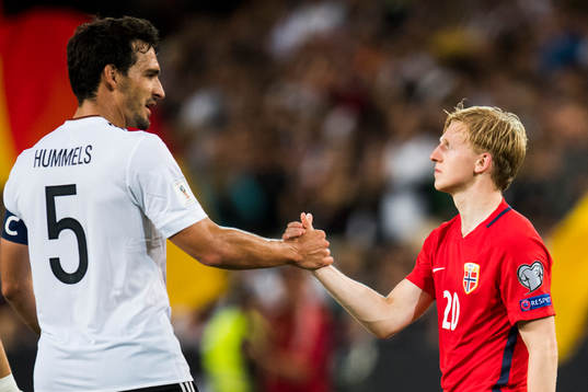 Mats Hummels of Germany and Mats Møller Dæhli of Norway