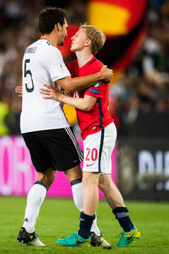 Mats Hummels of Germany and Mats Møller Dæhli of Norway